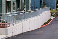 Image 3 of concrete architectural chamfer style retaining wall installed by Foundation Specialists concrete contractor in Washington State