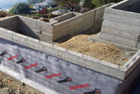 Image 2 of concrete foundation waterproofing installed by Foundation Specialists concrete contractor in Washington State