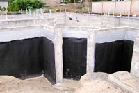 Image 1 of concrete foundation waterproofing installed by Foundation Specialists concrete contractor in Washington State