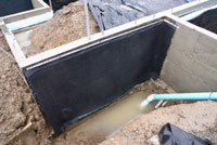 Image 3 of concrete foundation waterproofing installed by Foundation Specialists concrete contractor in Washington State